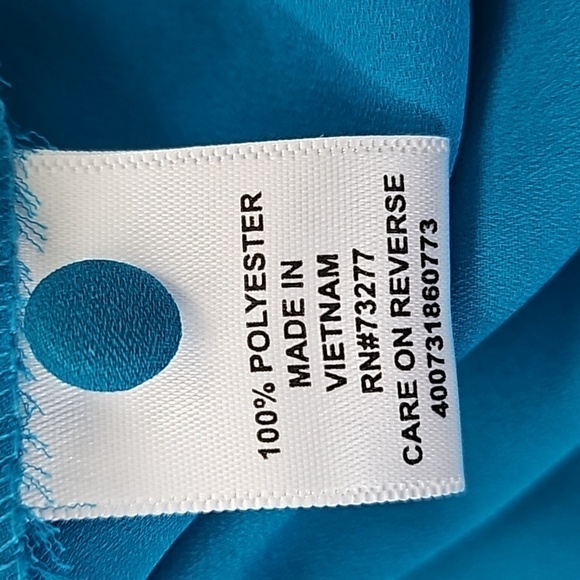 Elle Turquoise Sleeveless Blouse with Ruffles and Pleated Front - Picture 15 of 15